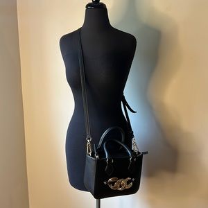 Steve Madden crossbody with top handle and gold chain detail